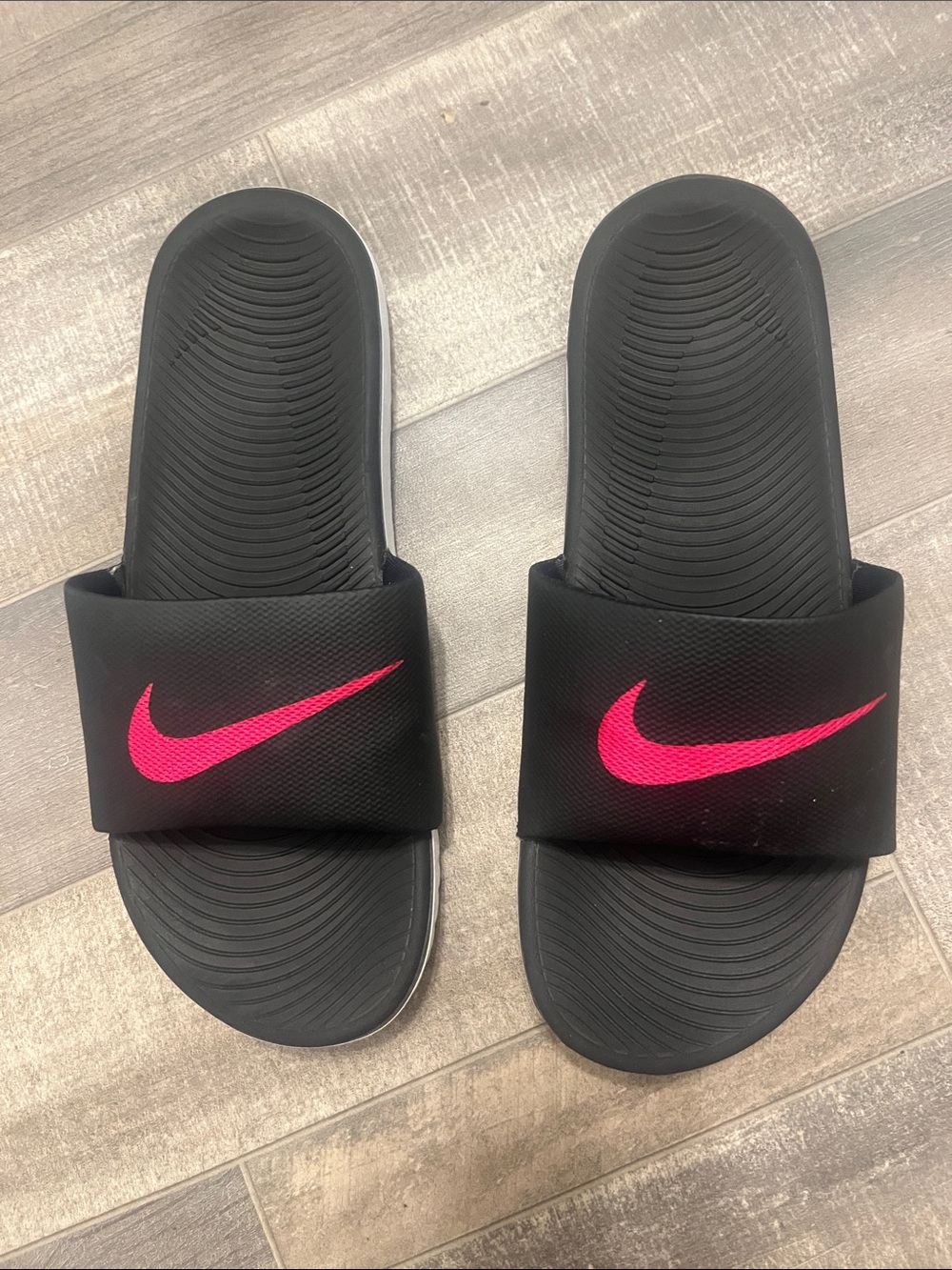 Nike Women's Black Slide Sandals with Hot Pink Swoosh
